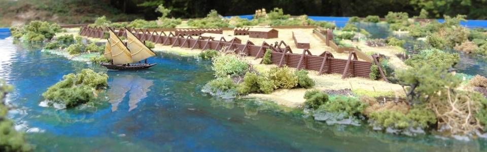 La palissade côté rivière et un navire au mouillage